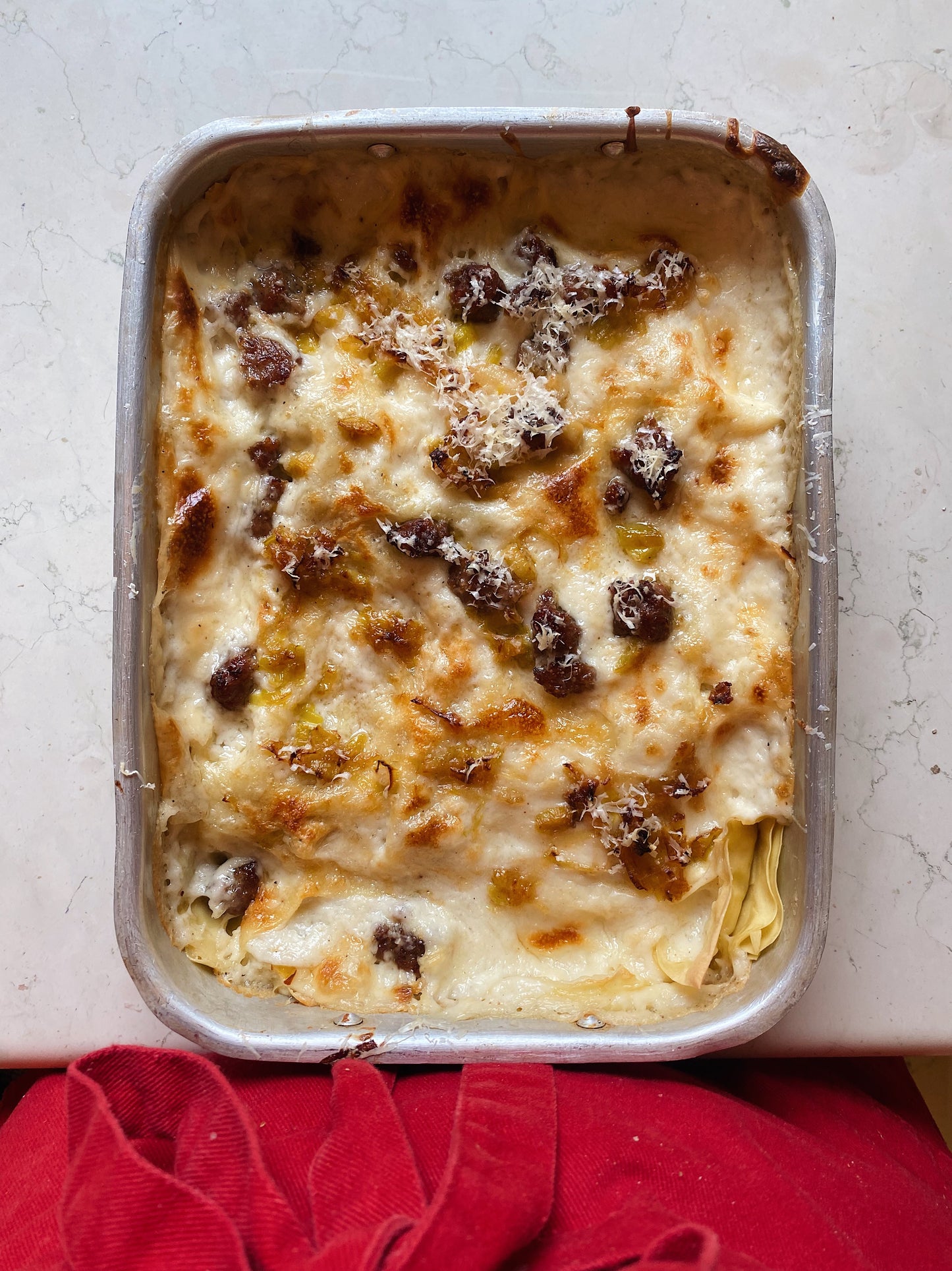 LASAGNETTA PORRI E SALSICCIA